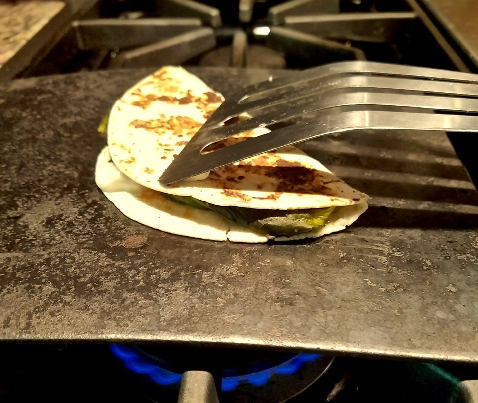 Quesadilla requires medium heat on a comal to turn the exterior crispy.